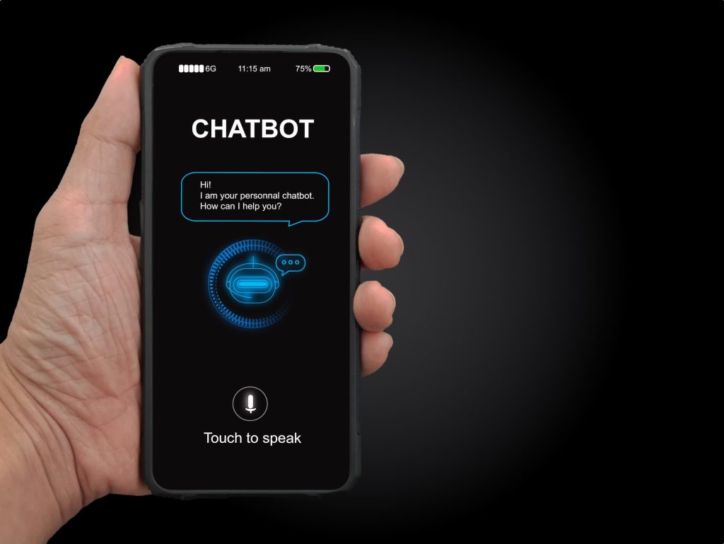 Man holding smartphone, displaying Chatbot